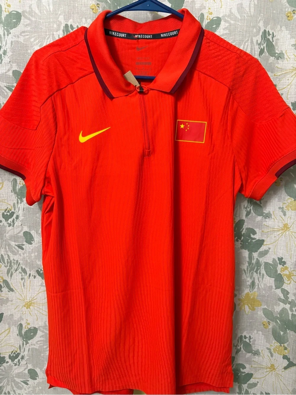 Nike Red Polo Top with Yellow Swoosh and Flag Patch
